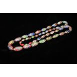 A VINTAGE ITALIAN MILLEFIORI GLASS BEAD NECKLACE The graduating oval segments with multicoloured