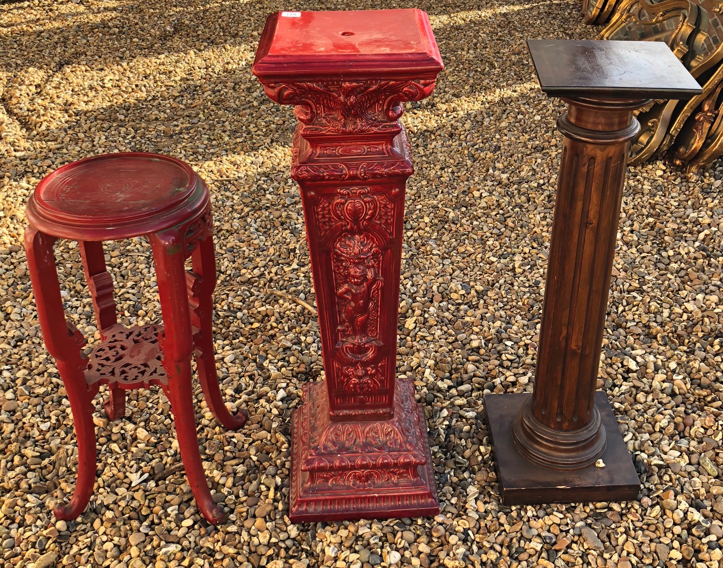THREE 20TH CENTURY DECORATIVE CHINESE STYLE JARDINIÈRE STANDS Red lacquered, with mahogany with