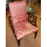A 19TH CENTURY CHINESE CHIPPENDALE DESIGN MAHOGANY UPHOLSTERED COCKPEN CHAIR Raised on carved and