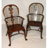 A MATCHED PAIR OF 19TH CENTURY WINDSOR OPEN ARMCHAIRS With hoop backs one yew the other ash, pierced