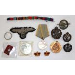 A MIXED LOT OF WORLD WAR I AND II INSIGNIA AND BADGES Including ROYAL FLYING CORPS cap badge and