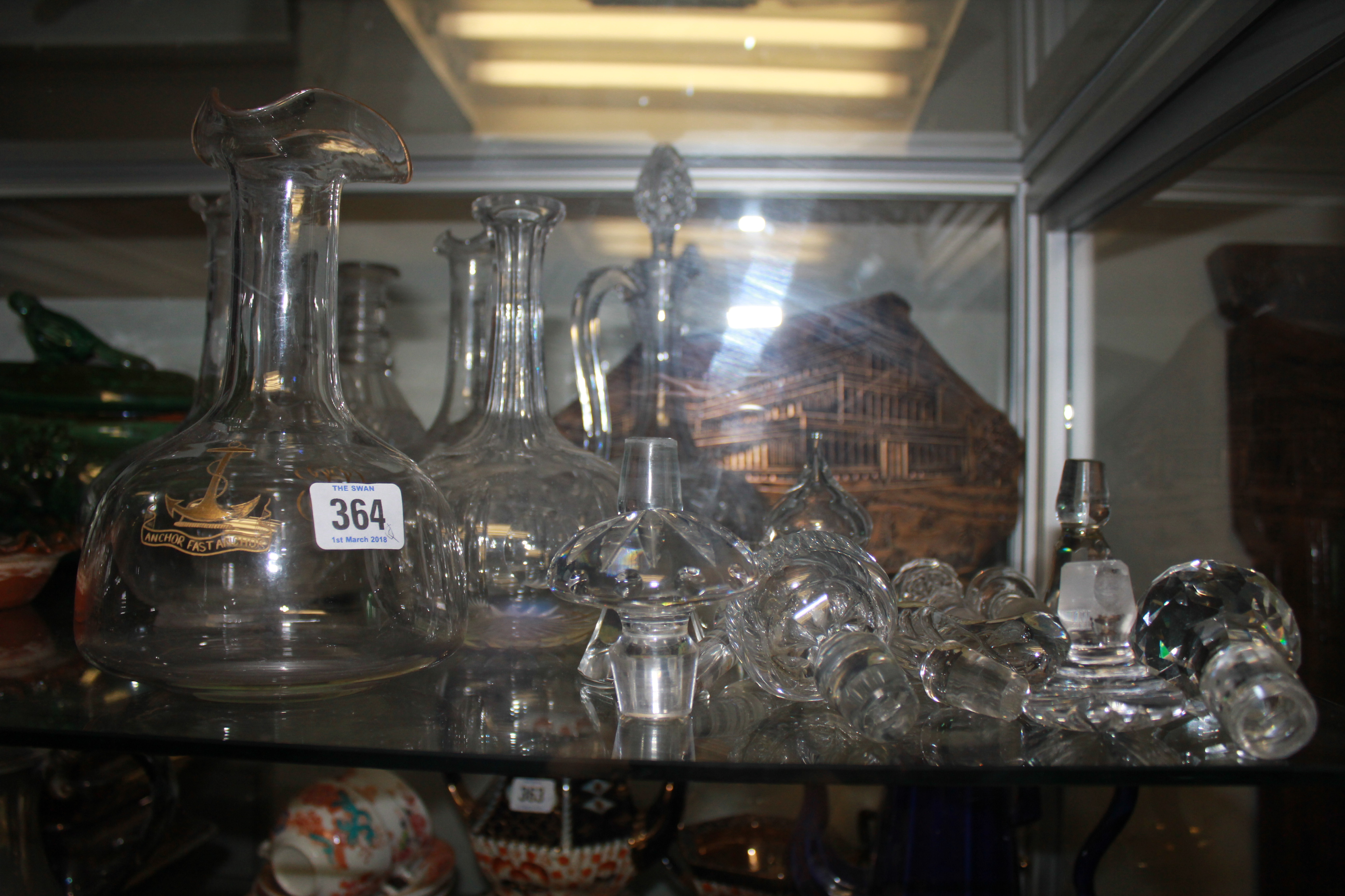 A COLLECTION OF EIGHT 19TH CENTURY AND LATER CUT LEAD CRYSTAL DECANTER BOTTLES Two baluster with