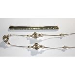 A VINTAGE SILVER AND PEARL NECKLACE The pearls set with silver rose form accents, marked 'Israel