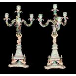 A PAIR OF 19TH CENTURY MILAN PORCELAIN FIGURAL CANDELABRA Three floral encrusted branches