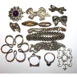 A COLLECTION OF VINTAGE SILVER AND WHITE METAL JEWELLERY ITEMS To include a fancy link bracelet, a