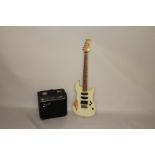 A SQUIER BULLET ELECTRIC GUITAR The body with cream finish and four pickups, marker dots to the neck