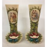 A PAIR OF 19TH CENTURY PAINTED GLASS VASES Decorated with foliate motifs and depictions of