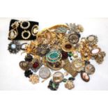 A COLLECTION OF VINTAGE COSTUME JEWELLERY Comprising gilt brooches set with paste stones, together