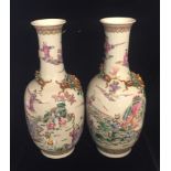 A PAIR OF 19TH CENTURY CHINESE VASES Brightly coloured and decorated with a scene of eight immortals