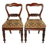 A PAIR OF WILLIAM IV ROSEWOOD CHAIRS With designer guild fabric upholstery.