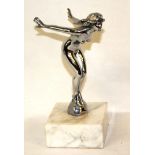 AN EARLY 20TH CENTURY CHROME FIGURAL CAR MASCOT Cast as a nude female with outstretched arms, marked