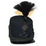 A VICTORIAN CAMERONIANS SHAKO AND PLUME Condition: very good, one/two moth holes, leather