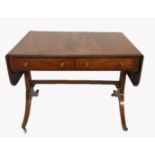 A REGENCY INLAID MAHOGANY SOFA TABLE With two drawers, raised sabre legs and brass castors. (h