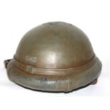 A GERMAN SCARCE TANK DRIVERS HELMET, DATED 1918 Made from thick leather and then dyed green.