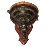 A 19TH CENTURY WALL BRACKET OF CLASSICAL DESIGN Finely carved with a mythical beast. (30cm)