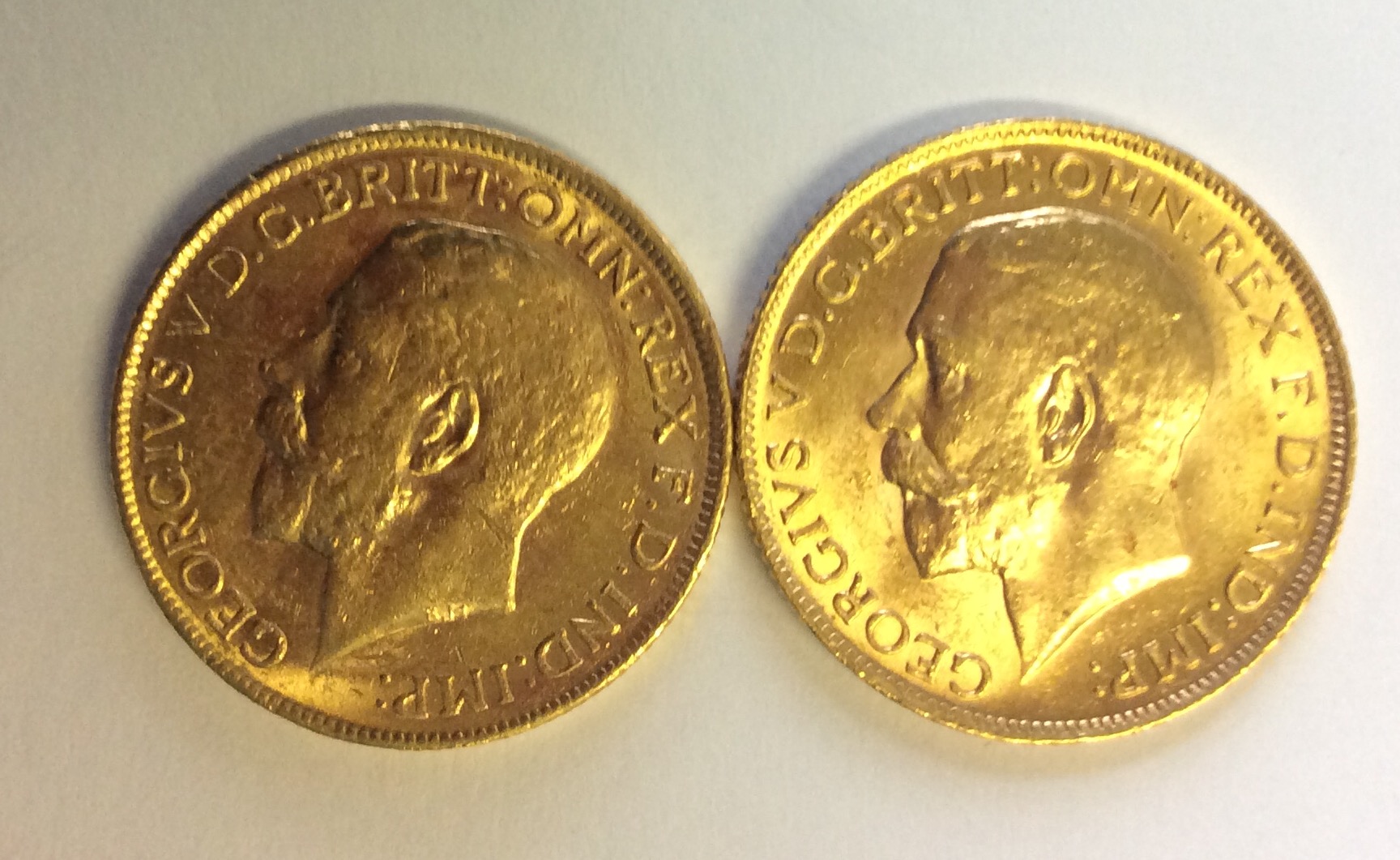 TWO EARLY 20TH CENTURY 22CT GOLD SOVEREIGN COINS Both dated 1912 and having a portrait of King