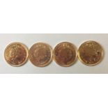 A COLLECTION OF FOUR MODERN 22CT GOLD HALF SOVEREIGN COINS Consecutive years dated 2001, 2002,