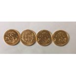 A COLLECTION OF FOUR MODERN 22CT GOLD SOVEREIGN COINS Consecutive years 2001, 2002, 2003 and 2004,