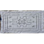 A 20TH CENTURY LINEN AND LACE TABLECLOTH Having geometric designs and a stylized floral motif. (