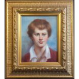 A 20TH CENTURY OIL ON BOARD PORTRAIT OF AMELIA EARHART Portrayed as a young lady, inscribed and