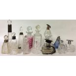 A COLLECTION OF EARLY 20TH CENTURY SILVER AND CUT GLASS SCENT BOTTLES Five having hallmarked