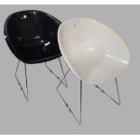 GLISS, A PAIR OF ITALIAN DESIGNER FIBRE GLASS TUB CHAIRS Black & white, on chrome legs. (57cm x 66cm