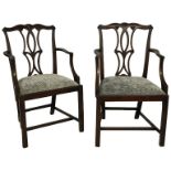 A PAIR OF 19TH CENTURY MAHOGANY CHIPPENDALE DESIGN ARMCHAIRS The scrolling carved and pierced