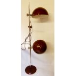 A VINTAGE FLOOR STANDING PHOTOGRAPHY LAMP Having two adjustable demilune shades, raised on a