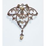 A VICTORIAN DIAMOND AND PEARL BROOCH/PENDANT Set with an arrangement of round cut diamonds forming a