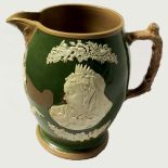 A RARE VICTORIAN SALT GLAZE COMMEMORATIVE JUG Having applied portrait of the Queen with Royal coat