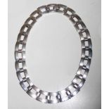 A STYLISH HEAVY MEXICAN SILVER COLLAR NECKLACE Of articulated square links, stamped 'Mexico', '