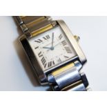 CARTIER, TANK FRANCAISE, A STAINLESS STEEL AND 18CT GOLD GENT'S WRISTWATCH Having a square silver
