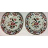 A PAIR OF 18TH CENTURY CHINESE FAMILLE ROSE PORCELAIN PLATES Hand painted with pink flowers,