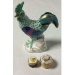 A VINTAGE HEREND PORCELAIN ROOSTER Hand painted in a green and blue pallet with purple scrolled