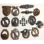 A COLLECTION OF FOURTEEN WORLD WAR II GERMAN BADGES Including a Crimea arm shield, infantry