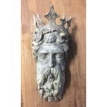 A DECORATIVE LEAD FOUNTAIN MASK OF NEPTUNE Modelled with shells and fish in his hair. (h 50cm x w