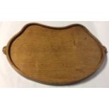 ROBERT THOMPSON, AN EARLY 20TH CENTURY OAK 'MOUSEMAN' KIDNEY FORM TRAY Carved with a two mice to the