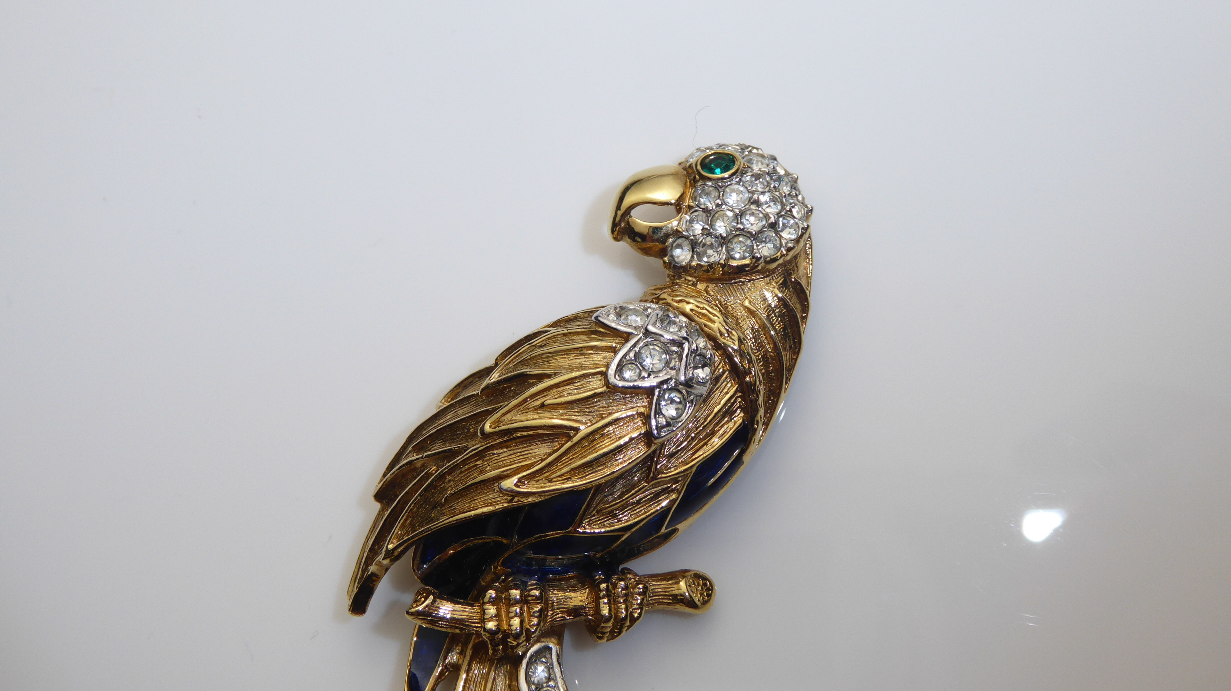 A 20TH CENTURY GOLD PLATED, ENAMEL AND PASTE SET PARROT BROOCH Perched on a branch with blue - Image 2 of 2