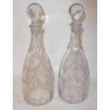 A PAIR OF 19TH CENTURY ETCHED GLASS MALLET FORM DECANTERS With target stopper and etched