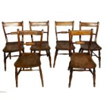 A SET OF SIX VICTORIAN OAK AND ELM OXFORD BAR BACK DINING CHAIRS.