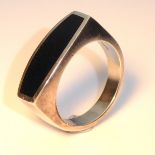 HANS HANSEN, A 20TH CENTURY DANISH SILVER AND ONYX GENT'S RING Having an oval onyx panel, date marks