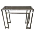 A CHROME HALL TABLE With inset smoked glass top. (102cm x 40cm x 79cm)