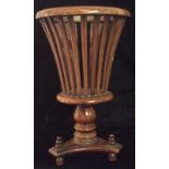 A VINTAGE MAHOGANY BASKET JARDINIÈRE Of tapering cylindrical shape, raised on tripod feet (approx