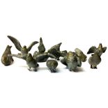 A COLLECTION OF NINE COLD PAINTED LEAD ANIMALIERS Modelled as pigeons in various poses. (approx 4cm)