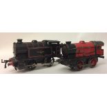 AN EARLY 20TH CENTURY HORNBY MECCANO 'O' GUAGE TIN PLATE CLOCKWORK TRAIN SET The two locomotives