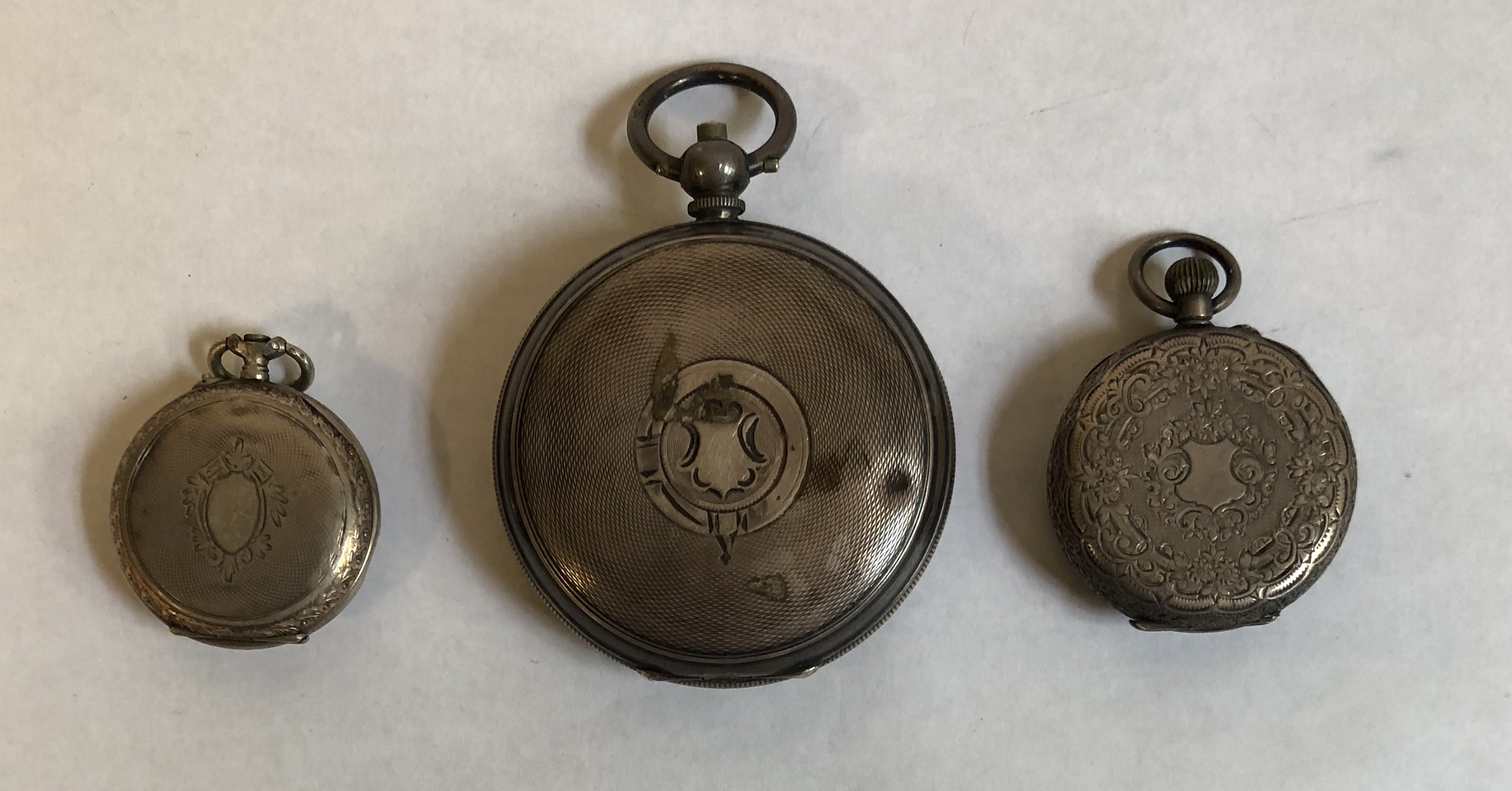 A VICTORIAN SILVER POCKET WATCH Along with two silver fob watches. - Image 2 of 2