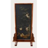 A LARGE 19TH CENTURY FLOOR STANDING CHINESE SCREEN Embroidered with monkeys climbing on bamboo, in a