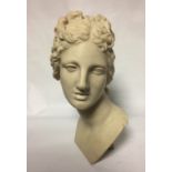 AFTER THE ANTIQUE, A 20TH BUST OF A CLASSICAL MAIDEN Depicted with a ribbon in her hair. (h 36cm)