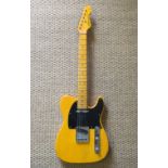 A VINTAGE REISSUE V52 GUITAR Having a telecaster type body with black scratch plate and Wlkinson