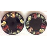 A PAIR OF VINTAGE MAJOLICA POTTERY CHARGER DISHES Each having applied hand painted shellfish on a